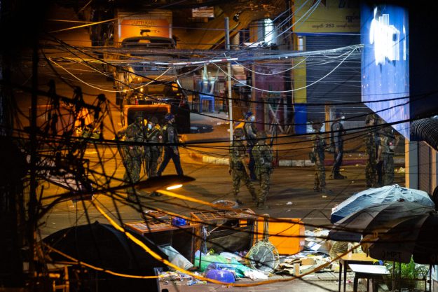 Myanmar military and police seen looking out for residents